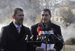 Prime Minister's Office officials Giró-Szász (left) and Lázár announce first round of public utility-fee cuts. 