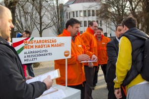 Fidesz activists collect signatures in support of government public utility-fee cuts. 