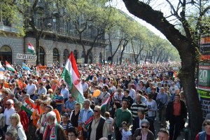 The Peace March proceeds down Andrássy Avenue toward Heroes' Square. 