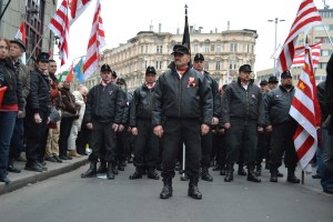 New Hungarian Guard István Mészáros stands at the head of a column of uniformed members at the Jobbik March 15 assembly in 2014. 