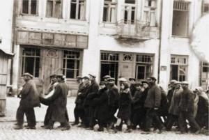 Jews deported from Hungary marching to their deaths outside 