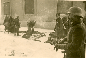 Hungarian Royal Army soldiers inspect corpses following massacre in Újvidék. 